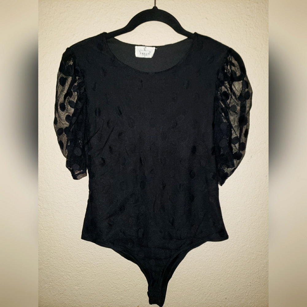 Black sheer polka dot short sleeve body suit. Size S